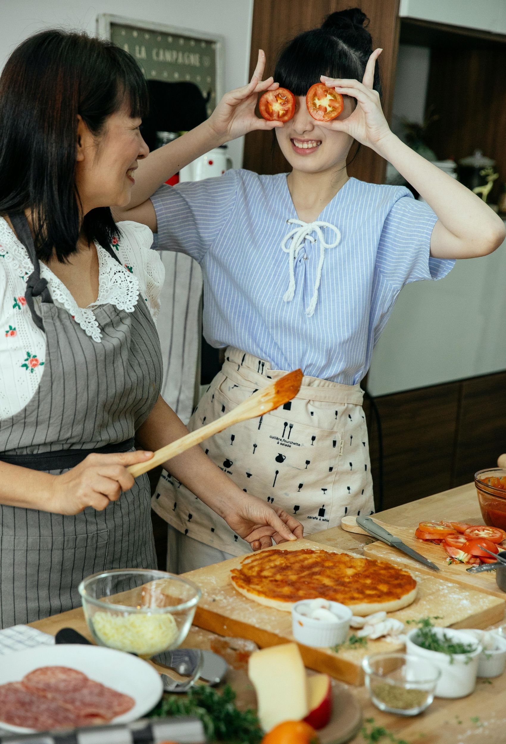 women making pizza together community and joy in recipes