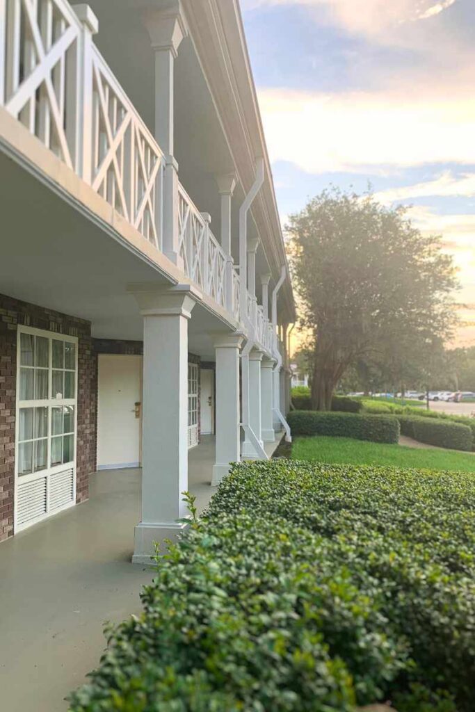 Exterior view of Magnolia Bend hotel building with windows and door to hotel rooms