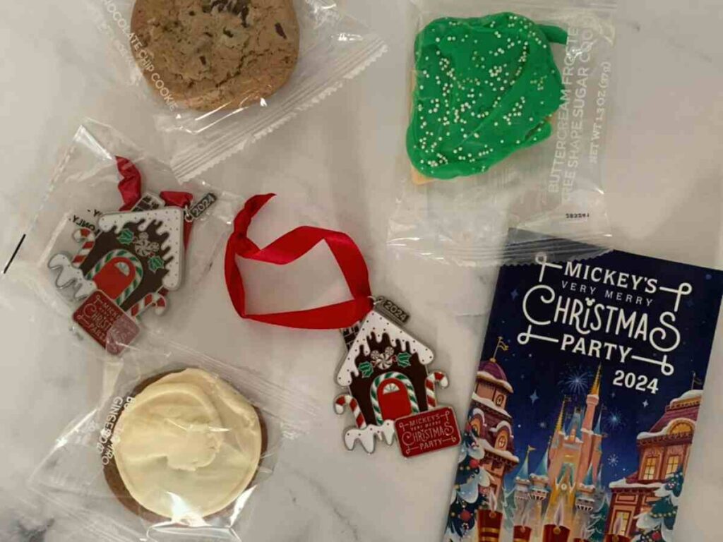 Complimentary cookies, gingerbread house ornament, and party brochure for Mickey's Xmas Party