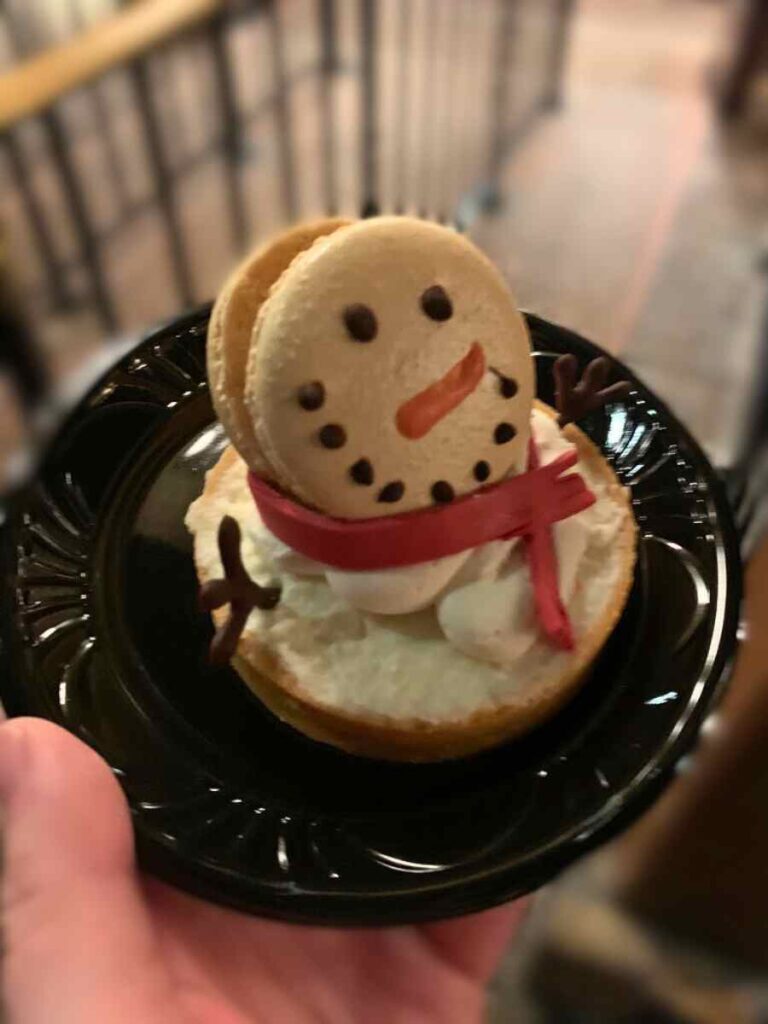 Toasted Marshmallow Panna Cotta Tart dessert that looks like a melting snowman