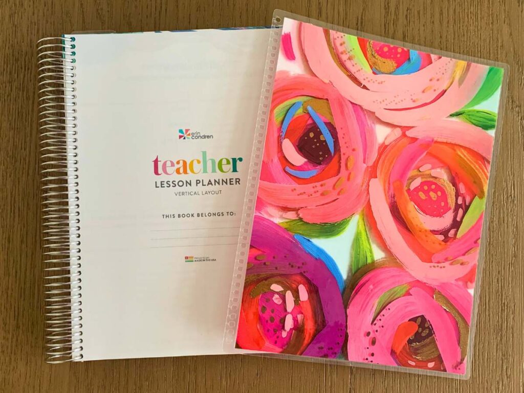 An Erin Condren planner taken out of the binding so you can see the laminate teeth and how it can pop into the metal coil