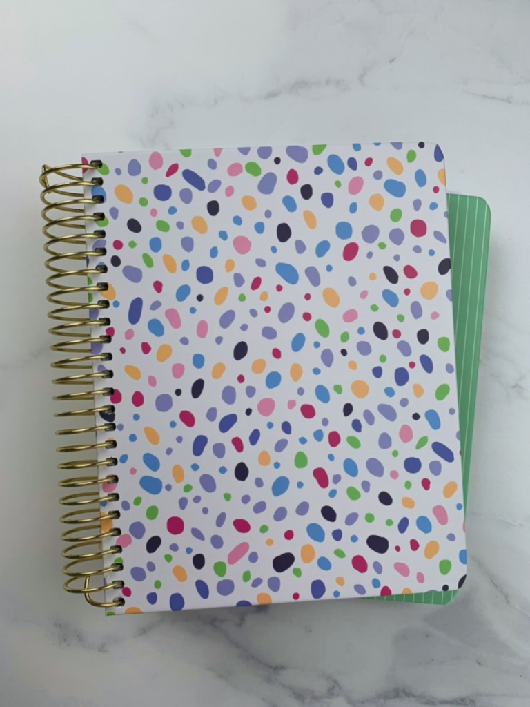 Vertical view of Sprouted Daily Planners 2025